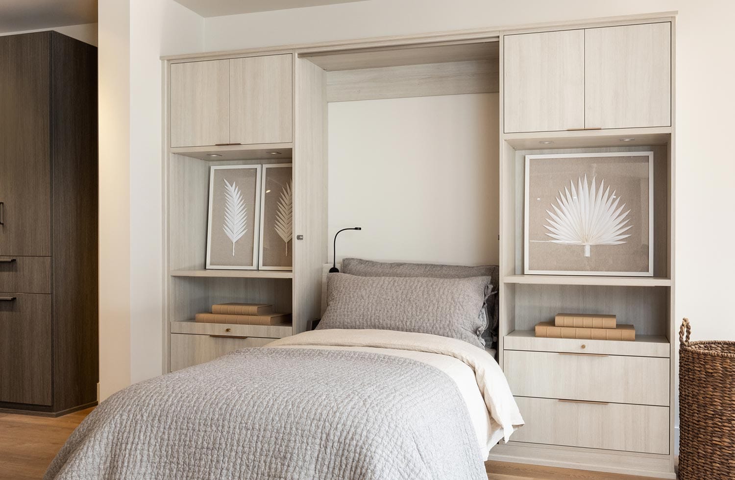 Custom bedroom wall bed with drawers and shelves for storage by California Closets