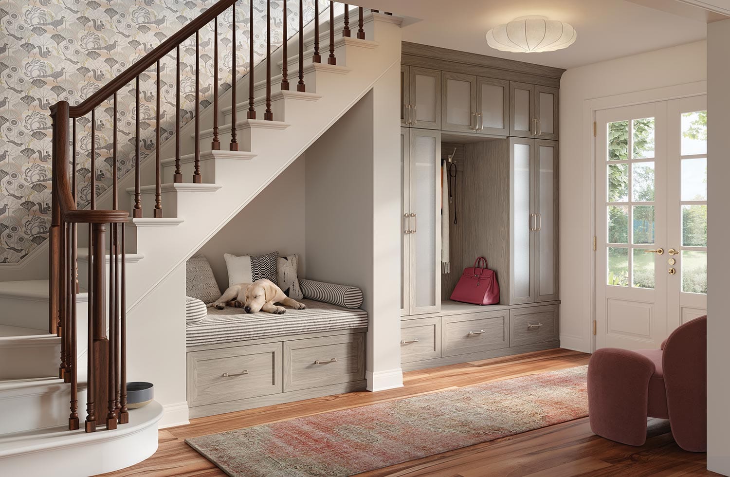 Elegant entryway storage with large custom closet, glass cabinets and bench seat by California Closets