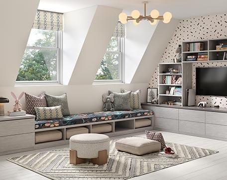 Playroom media center design with cabinets, shelving, bench seating in a light finish by California Closets