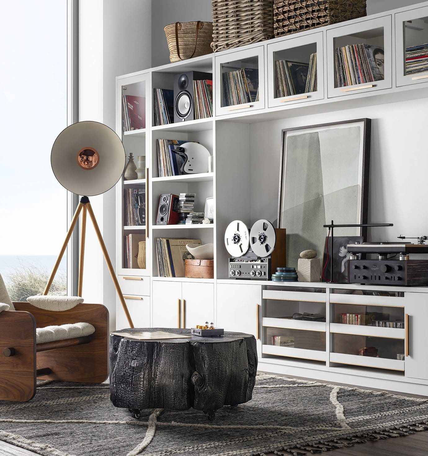 Entryway storage design for coats, and other outdoor gear with bench storage cabinets by California Closets